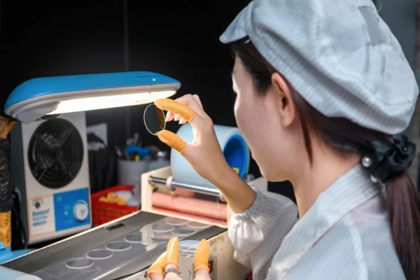 AR glass quality inspection by technician